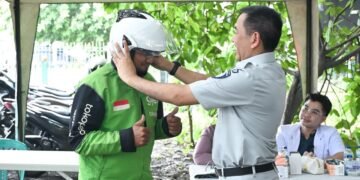 Kolaborasi Budaya Safety di Jalan Raya, Jasa Raharja Hadir di Tengah Komunitas Ojol Rawa Buaya, Jakarta