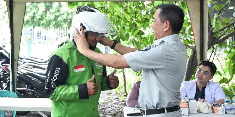 Kolaborasi Budaya Safety di Jalan Raya, Jasa Raharja Hadir di Tengah Komunitas Ojol Rawa Buaya, Jakarta