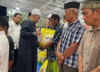 PTPN IV Regional IV Ibadah dan Kerja Sambil Santuni Fakir Miskin